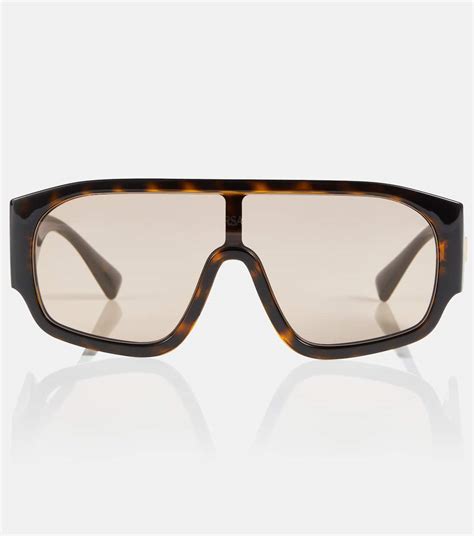 Tortoiseshell browline sunglasses in brown .